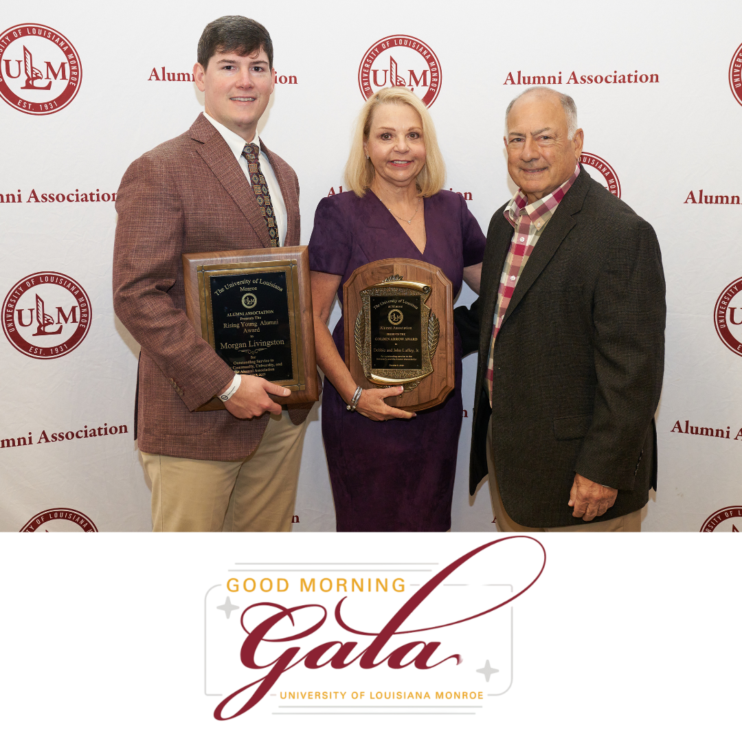 Three ULM alumni posing with award plaques in front of a ULM Alumni Association backdrop at the Good Morning Gala.