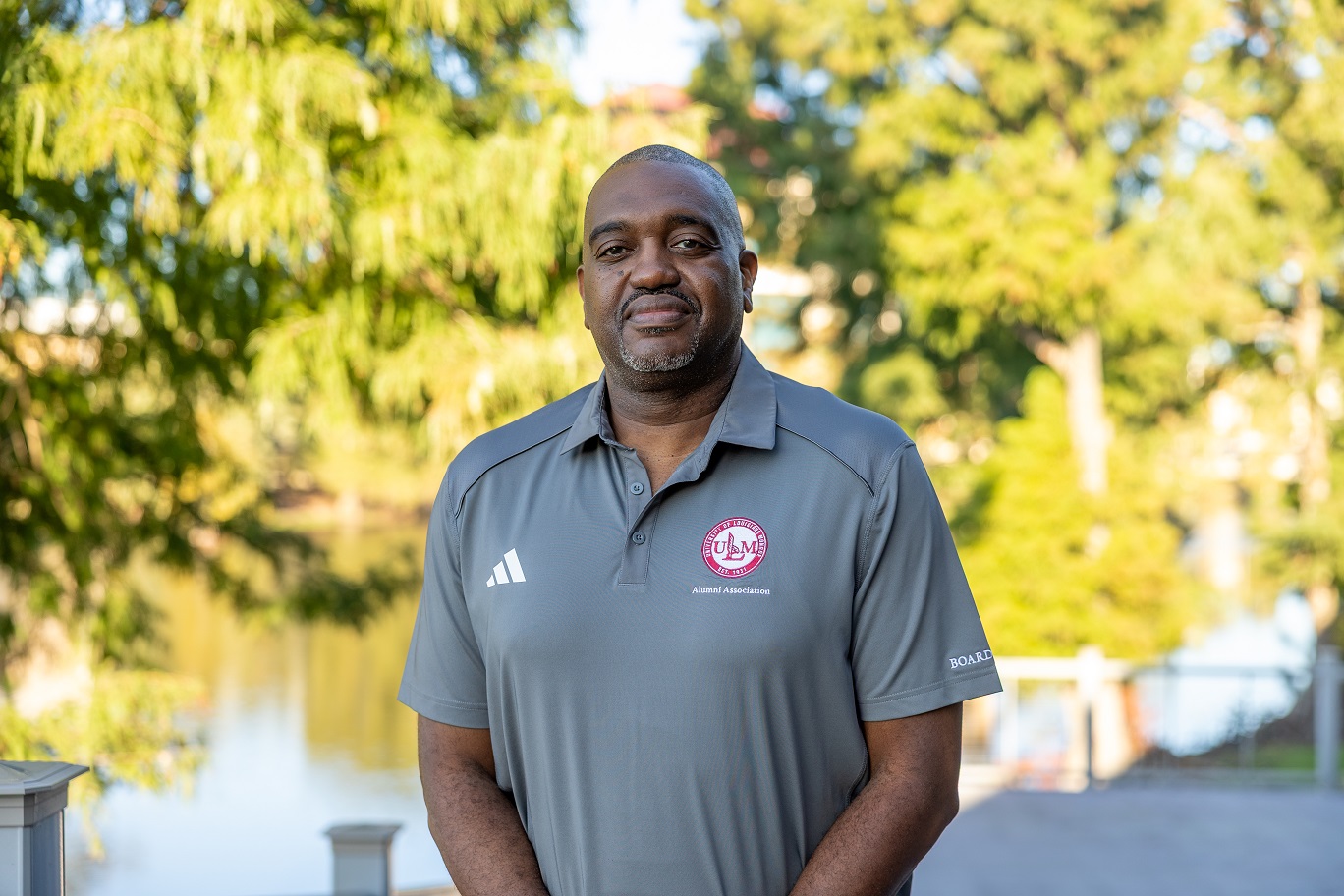 Photo of Elliott McGlory Portrait of Elliott McGlory, ULM Alumni Association Board Member, standing on campus near the bayou.