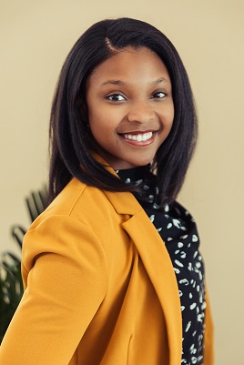 Professional headshot of Kennedy Boston-Woods