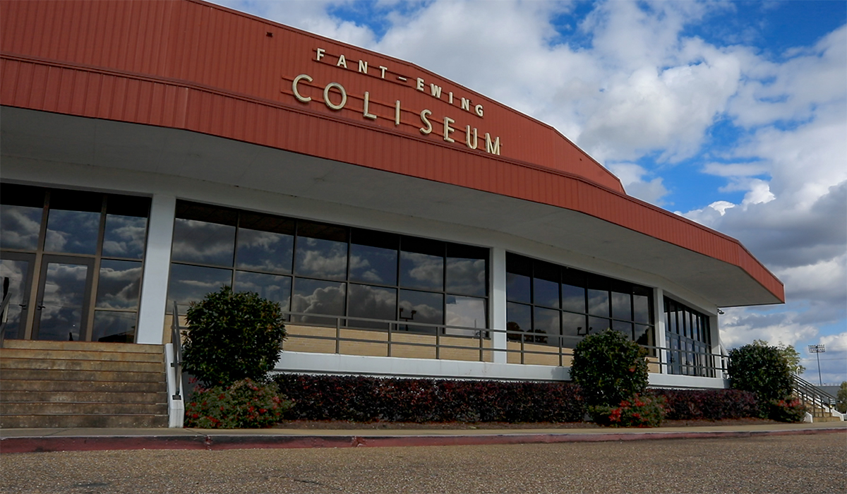 Fant-Ewing Coliseum, front of building, blue sky in background
