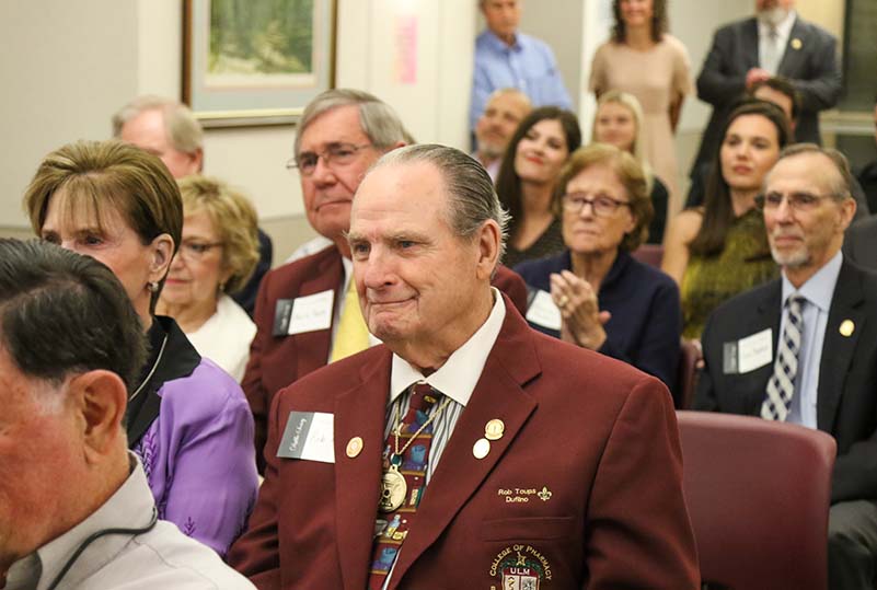 Alumni attending the Dulfiho Society Evening of Thanks at the College of Pharmacy building.